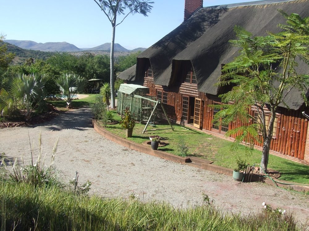 The gravel driveway approaching the lodge